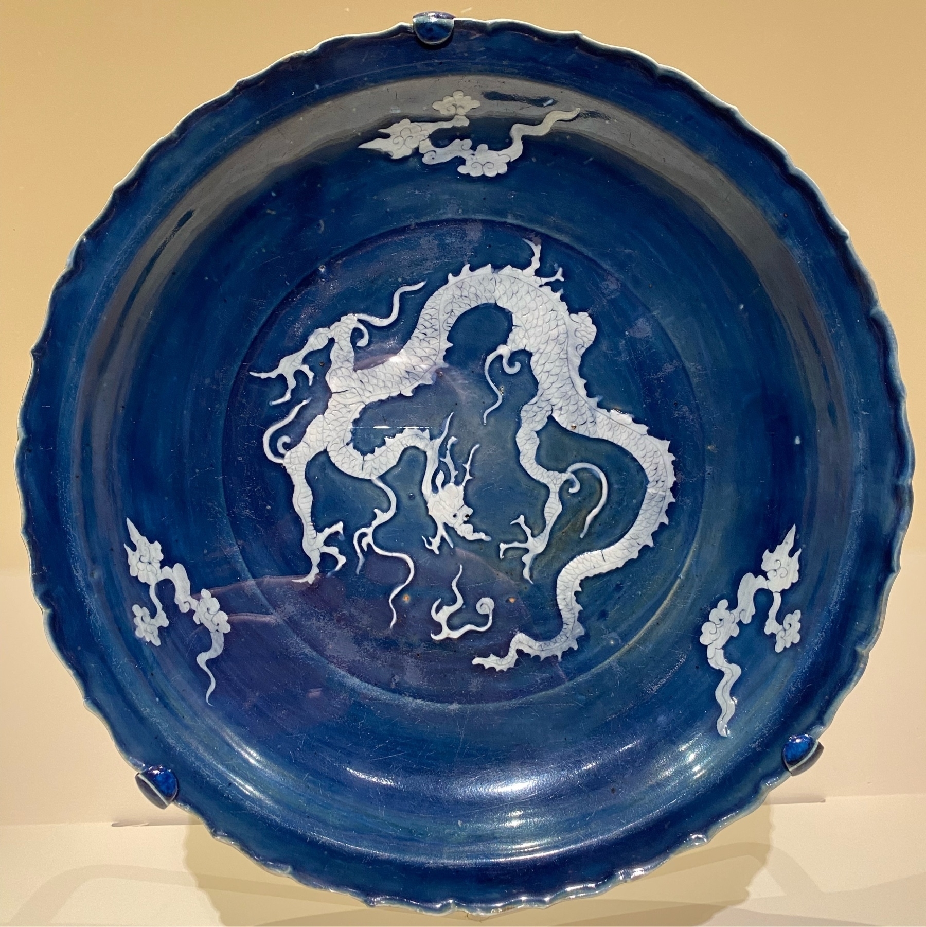 Blue platter with dragon motif.